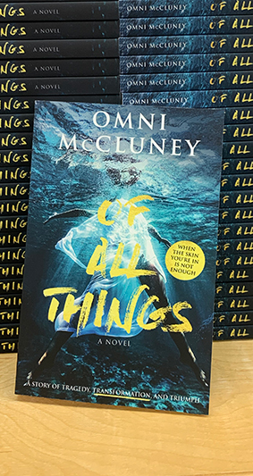 Stack of paperback books by Omni McCluney