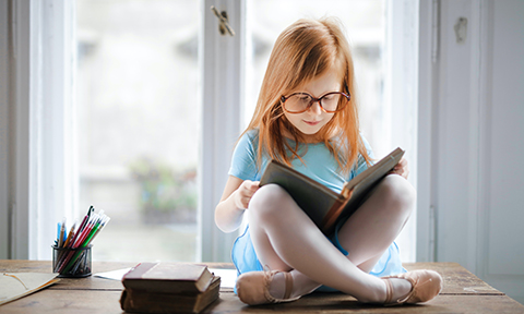 child reading a book