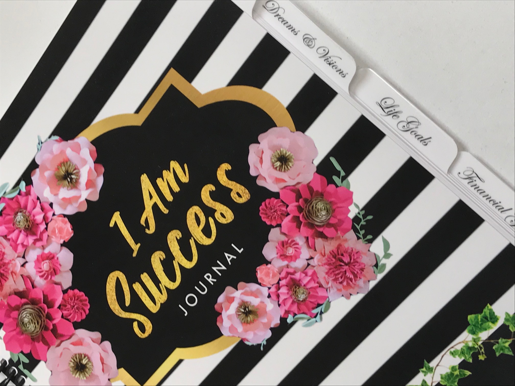 "I Am Success Journal" with white book tabs
